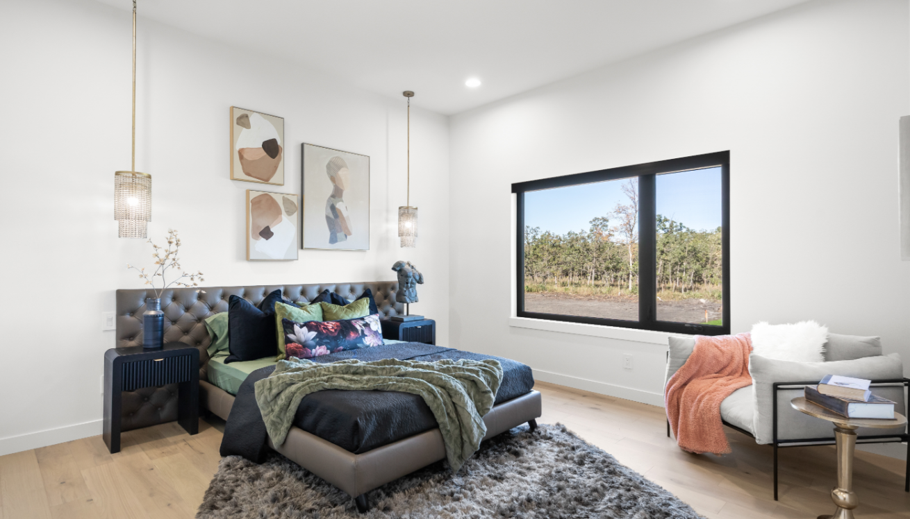 Contemporary bedroom with crystal pendant lights and large picture window